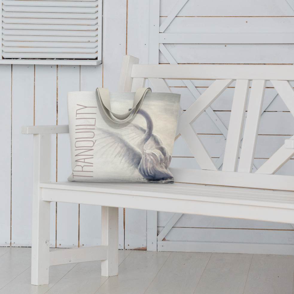 Wings of Tranquility Bag on a White Bench